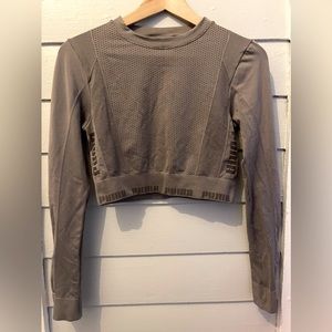 Puma M cropped long sleeved workout top. Never worn!!